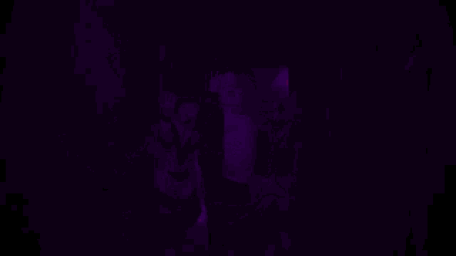 a purple background with a person in a penguin suit