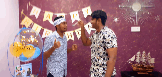 a man wearing a headband that says ' happy birthday ' on it