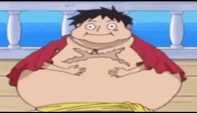 a very fat monkey d luffy from one piece is sitting on a deck .
