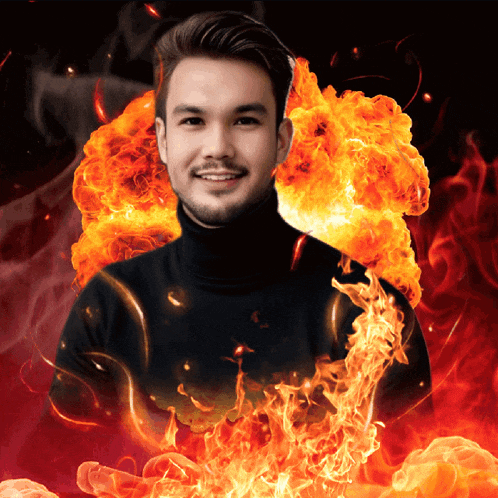 a man in a black turtleneck surrounded by fire
