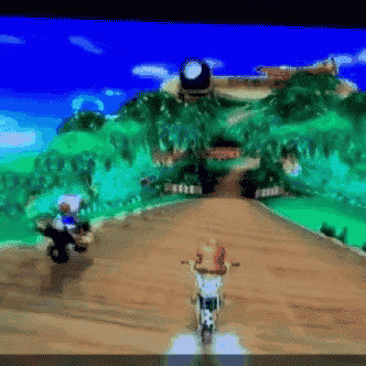 a video game screen shows a person on a motorcycle going down a dirt road