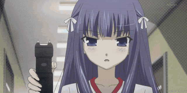 a girl with purple hair holds a flashlight in her hand