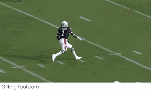 a football player with the number 1 on his jersey runs towards another player