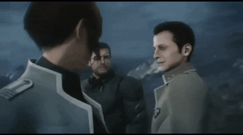 a group of men are standing next to each other and talking