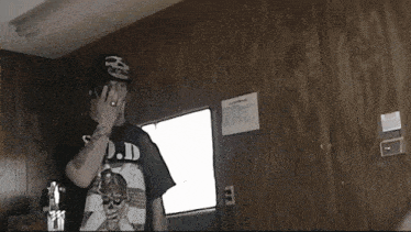 a man wearing a shirt that says s.o.d