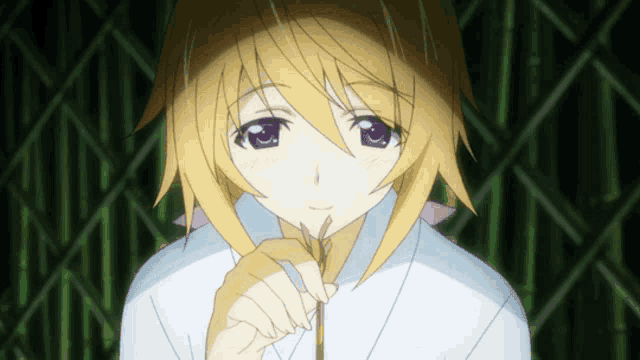 a girl with yellow hair and purple eyes is holding a flower in her hand