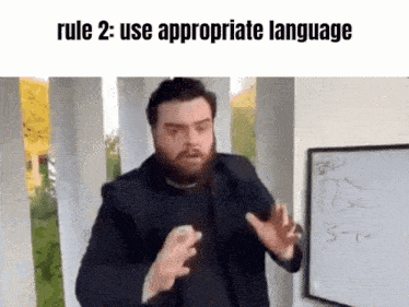 a man with a beard is standing in front of a white board with the words rule 2 : use appropriate language written on it