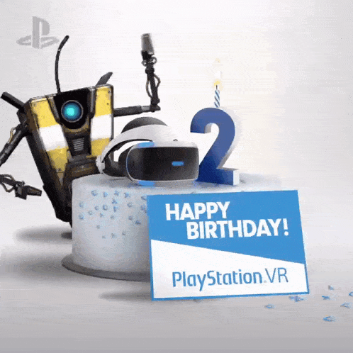 a birthday cake with a sign that says " happy birthday playstation vr "