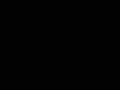 a black background with a few white dots on it .