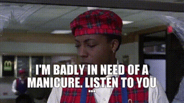 a woman wearing a plaid hat and vest is talking to a customer .