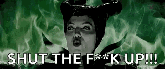 a woman with horns is making a funny face and says `` shut the f ** k up ! ''