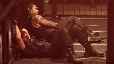 Roman Reigns Seth Rollins GIF - Roman Reigns Seth Rollins Chilling GIFs