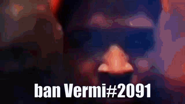 a close up of a person 's face with the words ban vermi # 2091 written on it