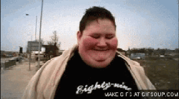 a fat man wearing a black shirt that says eighty-nine