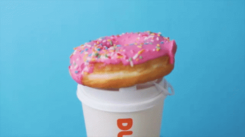 Dunkin Donut GIF - Dunkin Donut Strawberry Frosted Donut With Sprinkles GIFs