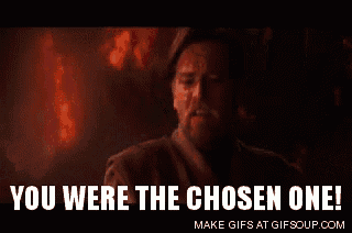 a man with a beard is standing in front of a fire and saying `` you were the chosen one ! ''
