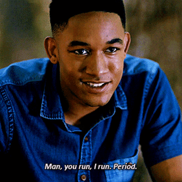 a man in a denim shirt says " man you run i run period "