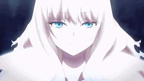 a close up of a girl 's face with white hair and blue eyes .