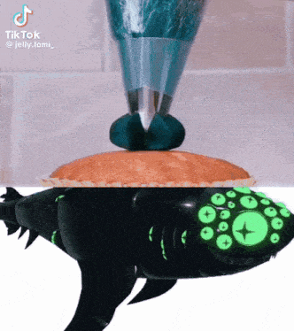 a shark with green eyes is sitting on top of a pie