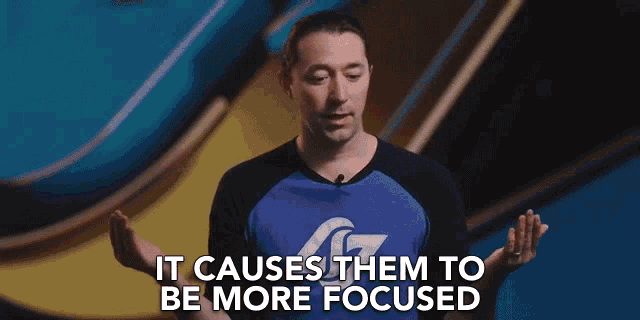 a man says it causes them to be more focused while wearing a purple shirt