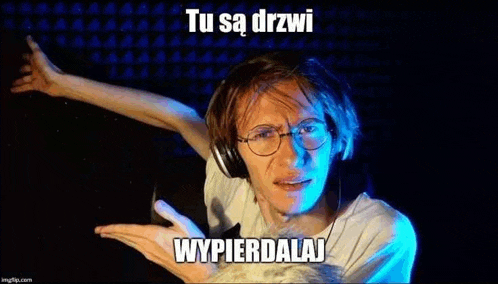 a man wearing headphones and glasses is making a funny face with his hands outstretched .