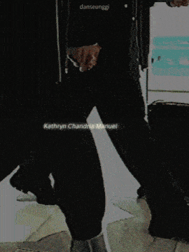 a blurry picture of a person holding a hammer in their hand