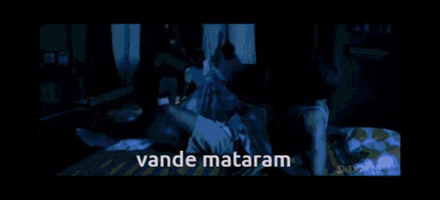 a group of men are fighting in a bedroom with the words vande mataram written on the bottom