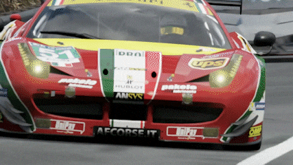 a red race car with the number 51 on it