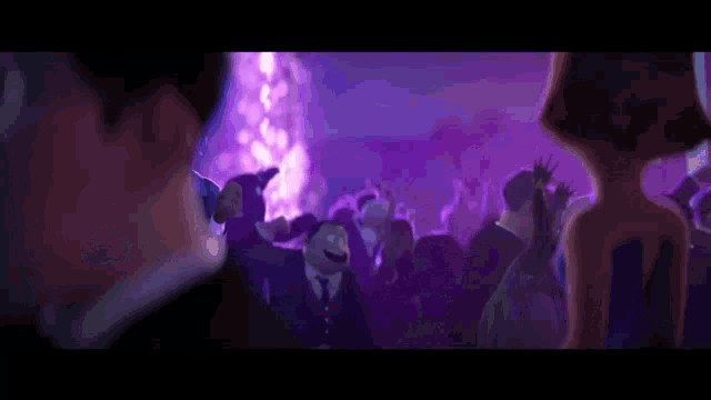 a wolf is holding a gun in a crowd of people .