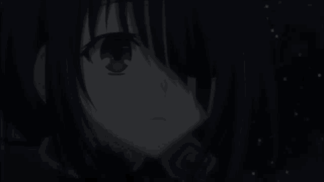 a close up of a anime character 's face with a dark background