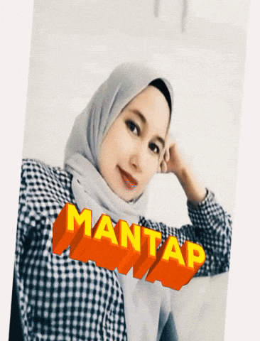 a woman wearing a hijab and a plaid shirt has the word mantap written on her chest