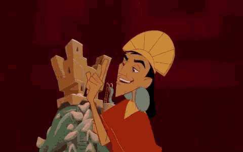 the emperor from the lion king is smiling and holding a statue .