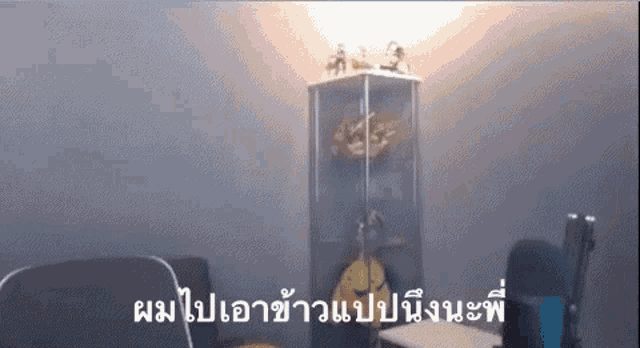 a room with a microphone and a shelf with a clock on it