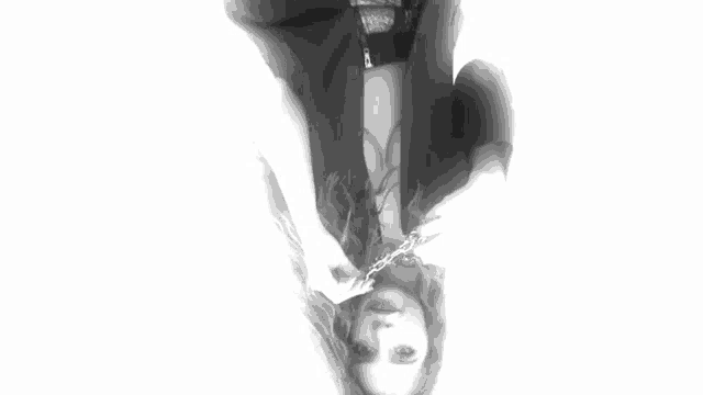 a black and white photo of a woman with a nose ring