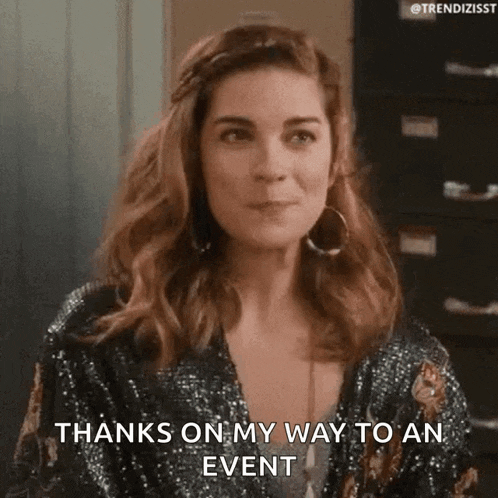 a woman is saying `` thanks on my way to an event '' while wearing a sequined top .