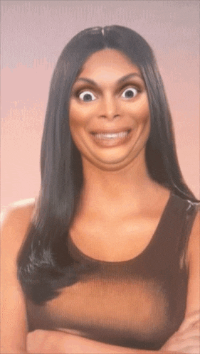 a close up of a woman making a funny face with her arms crossed