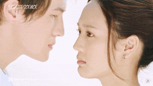 a man and a woman are looking at each other and the words delete scene are above them