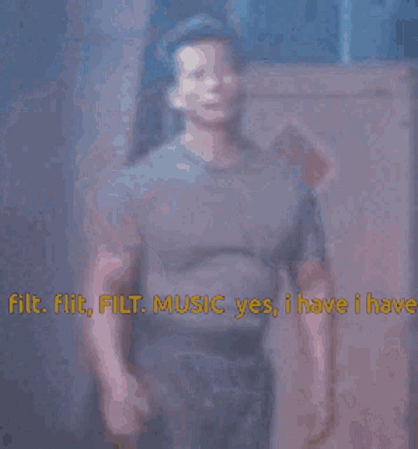 a blurry picture of a man with the words filt filt filt music yes i have i have in yellow letters