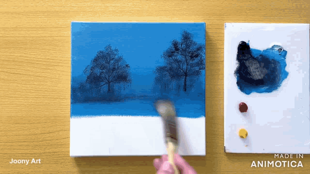 a painting of trees is being painted on a canvas with the words made in animatica on the bottom