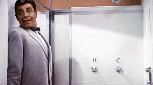 Jerry Lewis Shower GIF - Jerry Lewis Shower Hiding GIFs