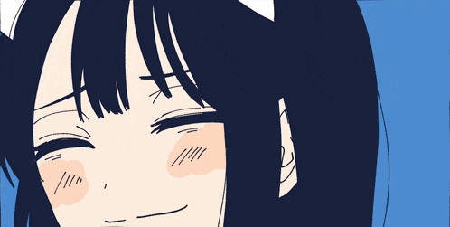 a close up of a girl 's face with her eyes closed and mouth open