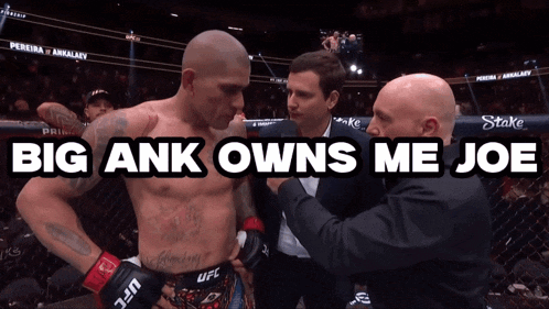 a man in a boxing ring with the words big ank owns me joe