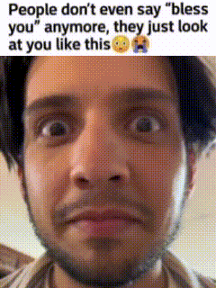 a man with a beard is making a funny face with a caption that says people don 't even say bless you