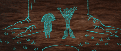 a drawing of a boy and a girl on a wooden table