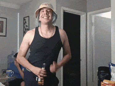 a man wearing a hat with pizza on it