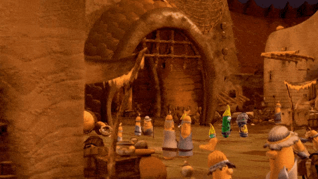 a group of gnomes are standing in front of a cave
