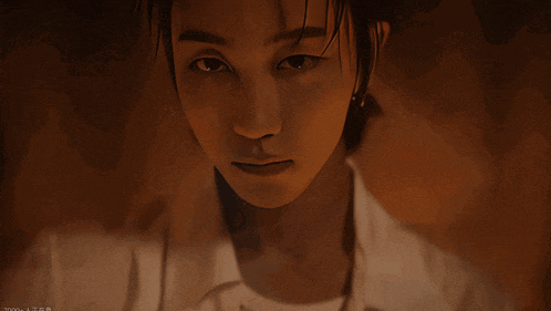 a close up of a person 's face with a watermark that says ' 2000 '