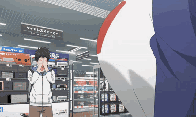 a man covering his face in a store with a sign above him that says wireless speaker