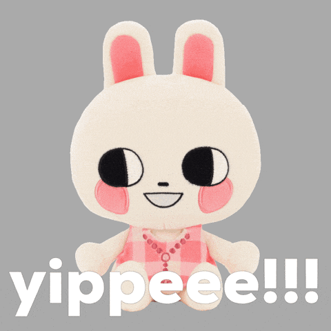 a stuffed bunny with the words yippee !!! behind it
