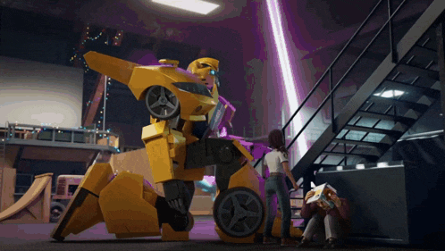 a yellow robot is standing next to a girl in a staircase